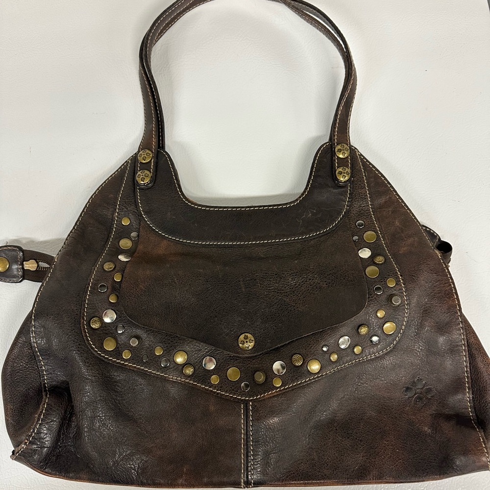 Patricia Nash Ergo Satchel. Chocolate. Metal studded detail.